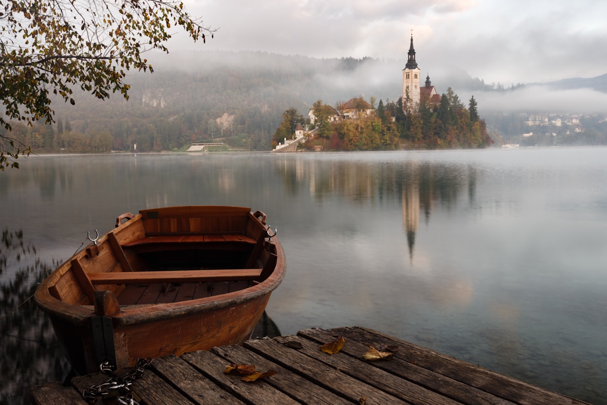 A rowing boat on Lake Bled at dawn, Slovenia